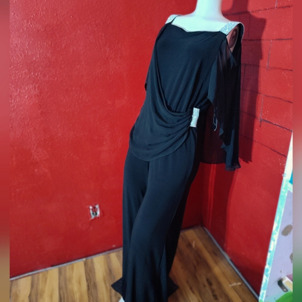 NWT Beautiful black romper size M